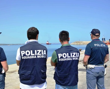 migranti polizia